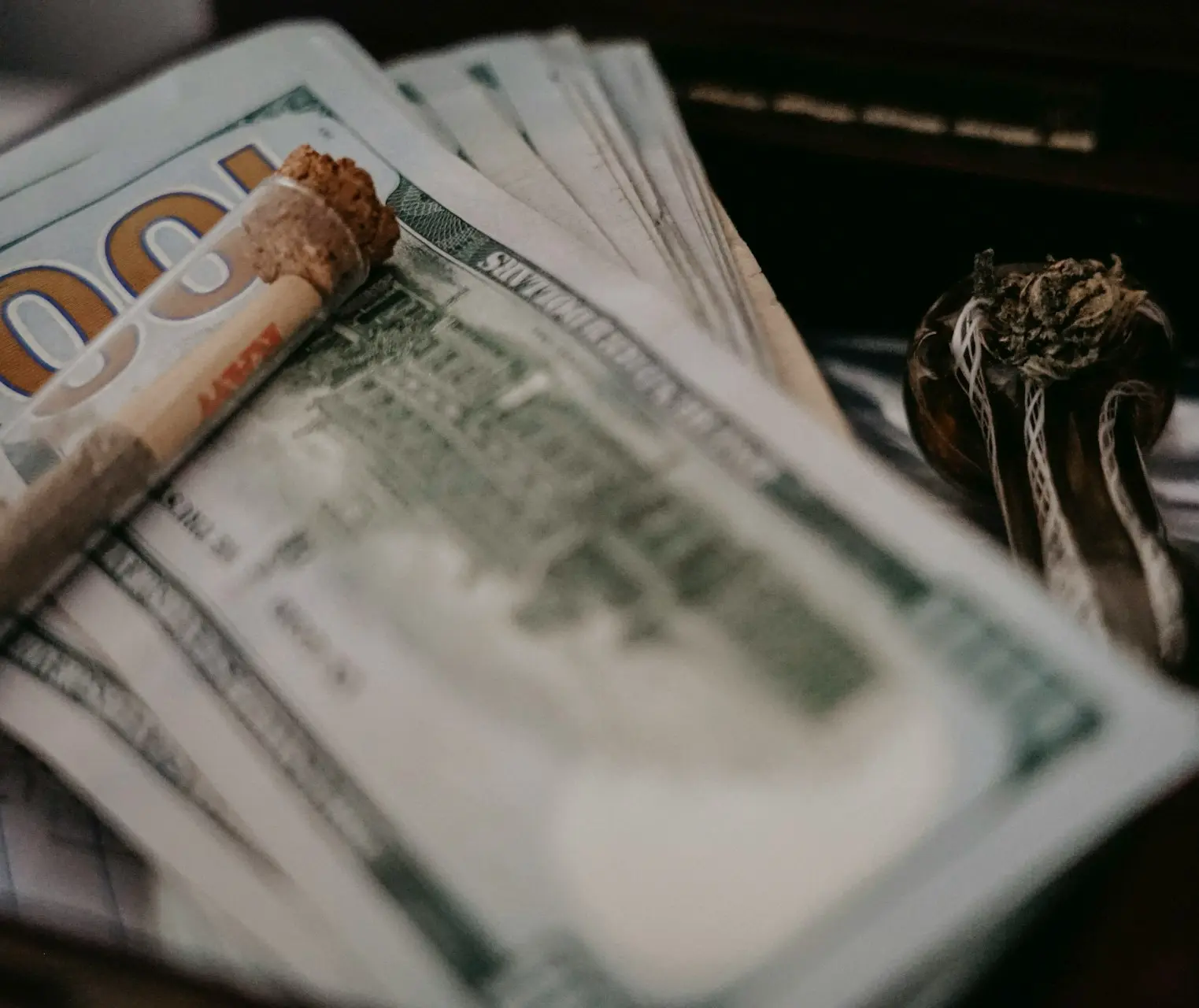 a pile of money sitting on top of a table